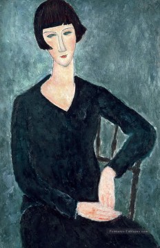 femme assise en robe bleue Amedeo Modigliani Peinture à l'huile